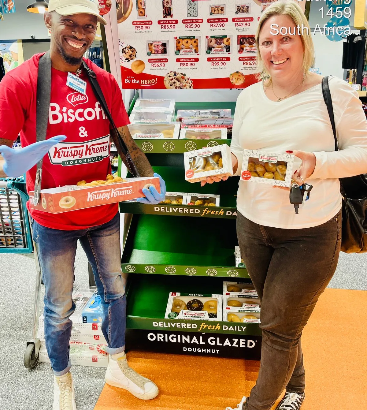 Sampling team handing out Krispy Kreme product in-store
