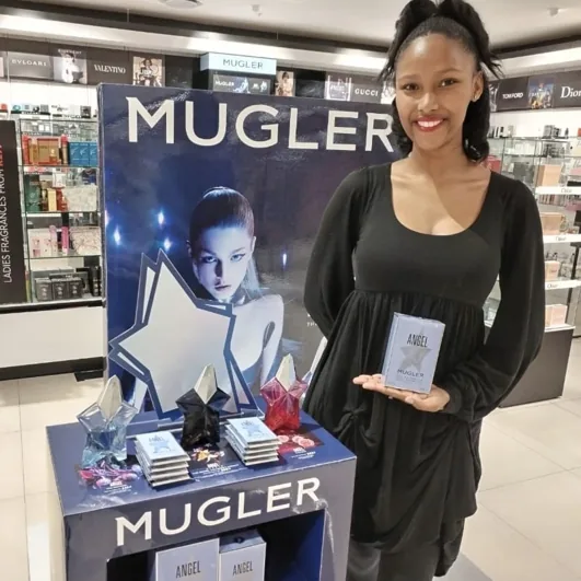 Mugler fragrance promoter with product display